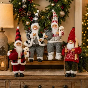 Detailed group shot of four 12-inch seated and standing Christmas Santa gnome dolls.