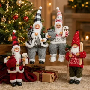 Group of four 12-inch Santa Claus figurines with various outfits for Christmas decor