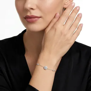 Elegant 925 sterling silver adjustable bracelet featuring circular pavé crystal charms