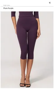 Detailed view of high-waisted brushed yoga capri leggings in deep purple for women