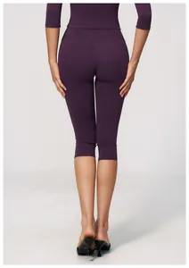 Detailed back view of dark purple high-waisted yoga capris for fitness and running
