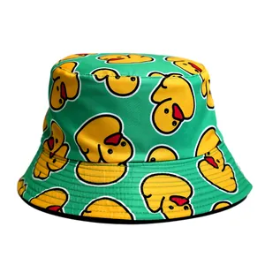 Detailed view of a green bucket hat featuring a vibrant yellow duck cartoon pattern