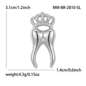 Creative silver alloy crown tooth brooch accessory with sparkling white rhinestones