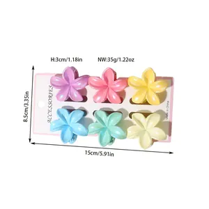 High quality detailed view of six colorful plumeria flower hair clips with size measurements