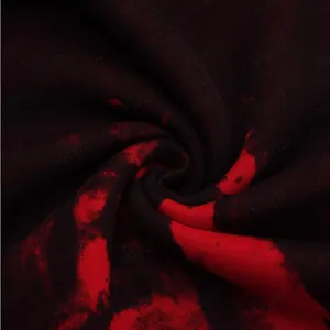Detailed view of the premium red and black splatter print fabric on men's casual hoodie
