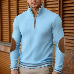 Stylish men's light blue quarter-zip ribbed knit sweatshirt with brown suede elbow patches