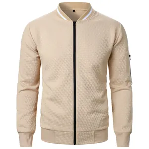 Close-up of khaki textured jacquard zip-up sweatshirt with ribbed collar