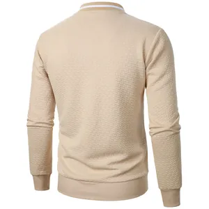 Detailed back view of men's beige jacquard sweatshirt featuring textured fabric