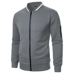 Close-up of a grey men's jacquard zip-up sweatshirt featuring a baseball collar.