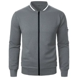 Detail shot of men's gray jacquard zip-up sweatshirt with a striped stand collar