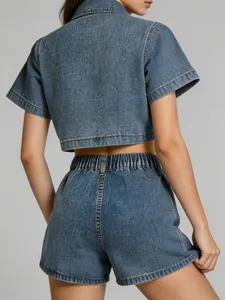 Back view of a trendy two-piece denim set with cropped shirt and high-waist shorts