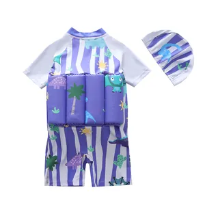 Vue arrière du maillot de bain flottant pour enfant avec motifs dinosaures et bonnet assorti