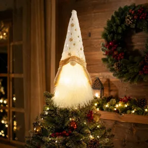 Detailed view of white plush gnome Christmas tree topper with glowing warm LED beard