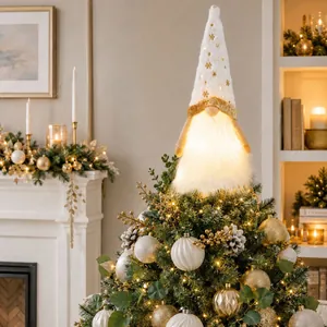 Detailed view of white LED gnome tree topper with glowing beard and gold stars