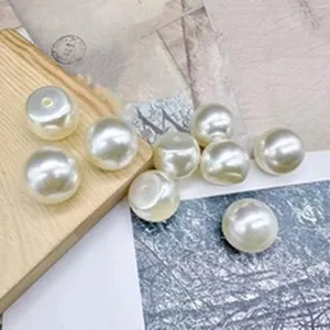 Detailed macro view of wrinkled ABS imitation pearls with matte finish for DIY jewelry