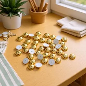 Detailed view of golden ABS textured imitation pearl beads for DIY jewelry making