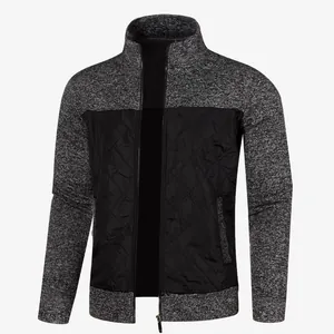 Detailed view of men's mixed-knit cardigan jacket with quilted panels and zipper