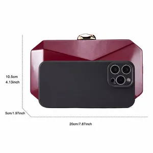 Detail view of burgundy geometric evening clutch bag with dimensions 20x10.5x5cm