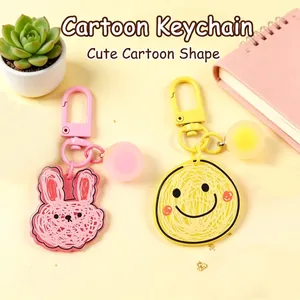 Cute cartoon rabbit and smiley face acrylic keychains with colorful clips and fuzzy balls