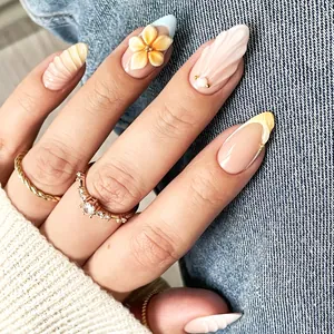 Detailed macro view of luxury press-on nails with 3D shell and floral art decorations