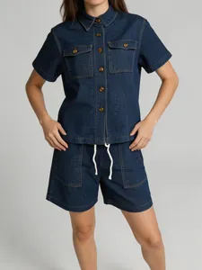 Vintage style women's dark blue denim set with button-up shirt and drawstring shorts