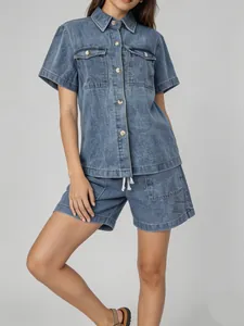 Vintage washed blue denim two-piece set featuring short sleeve shirt and casual shorts