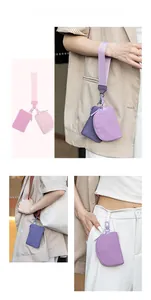 Detail of a portable 2-in-1 wristlet card holder and mini coin purse in purple