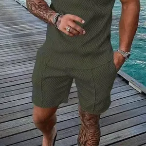 Detail of men's summer shorts set with olive green 3D geometric pattern texture