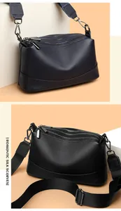 Modern pebbled cowhide leather crossbody bag with multiple zipper compartments in navy and black