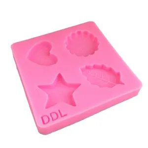 Moule en silicone rose avec formes de cœur étoile et feuille pour argile et chocolat DIY