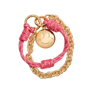 Charm de sac élégant en corde rose et chaîne dorée avec pendentif smiley vintage
