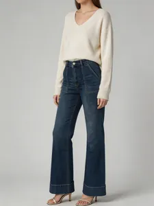 High-waisted wide-leg denim jeans with stylish cuffed hems in a washed blue finish