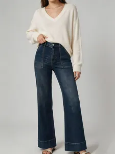 Womens high-waisted wide-leg denim jeans with a washed finish and casual loose fit