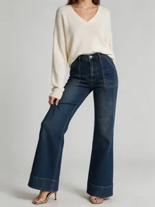 Women's high-waisted wide-leg denim jeans with cuffed hem and front pockets