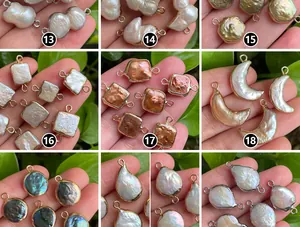 Detail of assorted gold-plated natural baroque pearl charms for DIY jewelry making