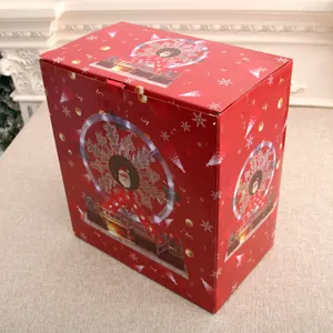 Detailed view of the festive red gift box for the luminous Ferris wheel music box