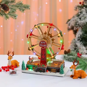 Detailed view of an illuminated Christmas Ferris wheel music box with festive lights