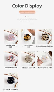 Detail view showing seven color options of 5cm cat-shaped acetate hair claw clips