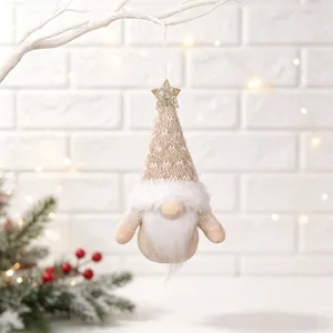 Detailed view of a cozy knitted Christmas gnome hanging ornament with a golden star