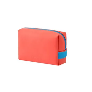 Bright coral PU makeup bag with blue contrast zipper and side handle strap