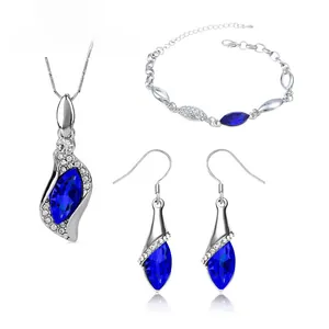 Detailed view of marquise blue crystal jewelry set including necklace, bracelet and earrings