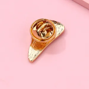 Detailed back view of gold metal pizza brooch showing secure butterfly clasp texture