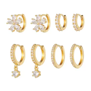 Elegant 4-piece gold plated flower pendant earring set with cubic zirconia stones