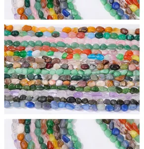 Macro display of irregular amethyst and aquamarine natural gemstone bead strings