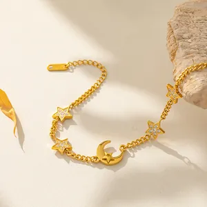 Gold stainless steel moon and star bracelet with sparkling cubic zirconia inlay