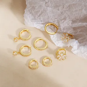 Elegant gold-plated flower earrings set featuring sparkling zircon stones and hoop styles