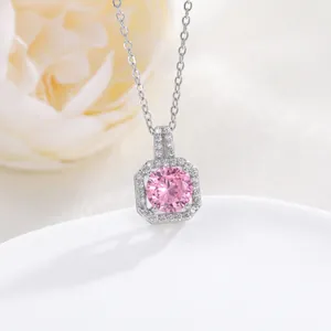 Macro shot of pink round zircon perfume bottle pendant necklace with silver link chain