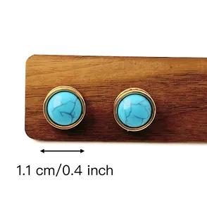 Detail shot of blue turquoise earrings with gold base showing 1.1 cm diameter size