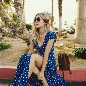 Women's deep blue V-neck polka dot maxi dress with short sleeves and high slit