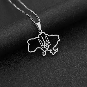 Macro shot of polished stainless steel Ukraine map necklace with trident logo
